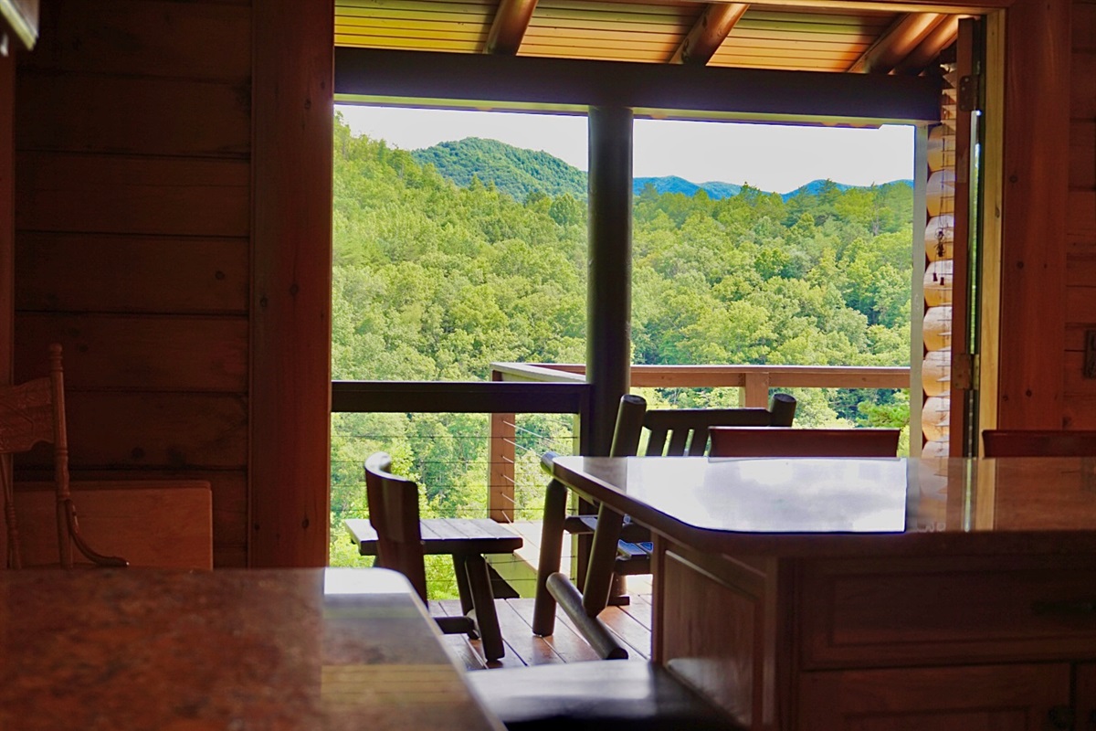 Breathtaking mountain views from your rustic dining space—perfect for unforgettable meals!