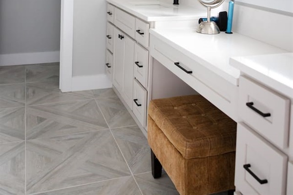 Master bathroom has private water closet, makeup vanity, two sinks, a bathtub, and a large walk-in shower with two shower heads. Amazing water pressure!