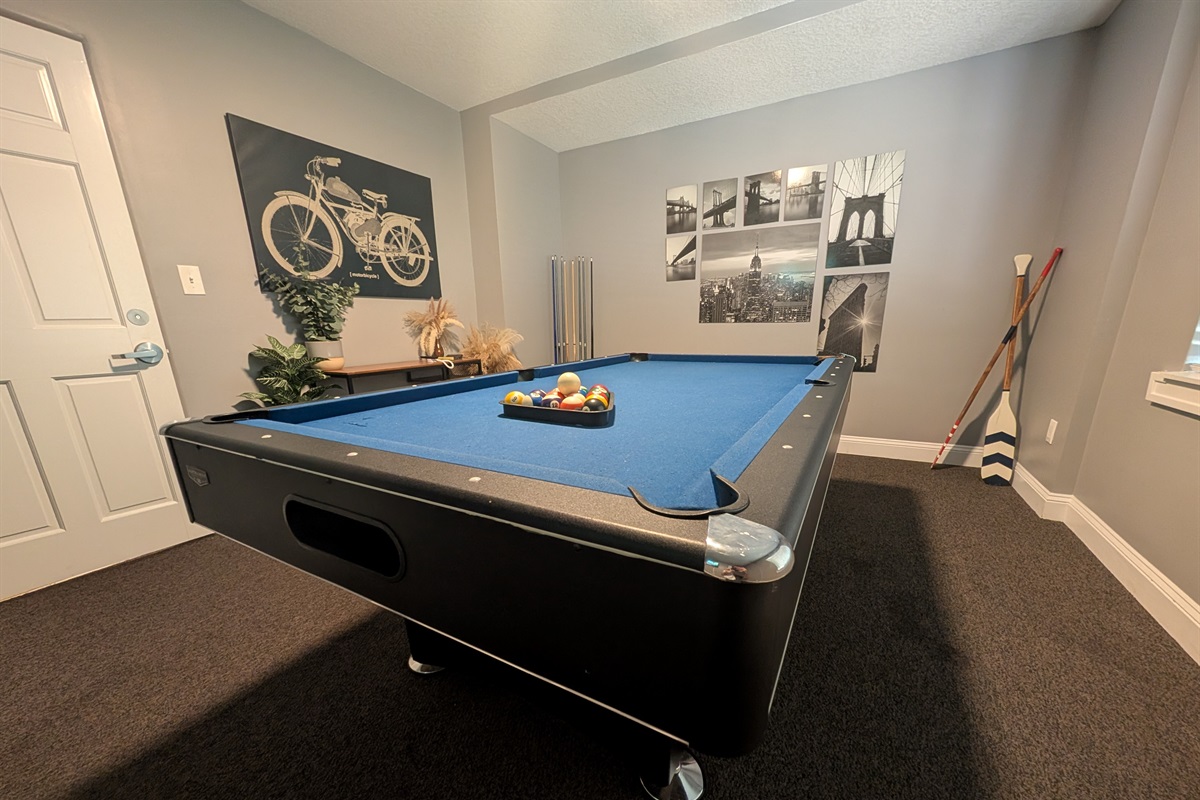 Full size pool table in the game room