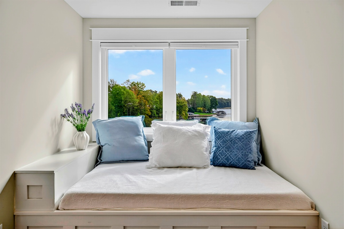This full-size bed is such a unique option for this bedroom! It also adds such a romantic touch to this room. It offers such flexibility for parents who need a sleeping option for their kids that might need to sleep in their bedroom.