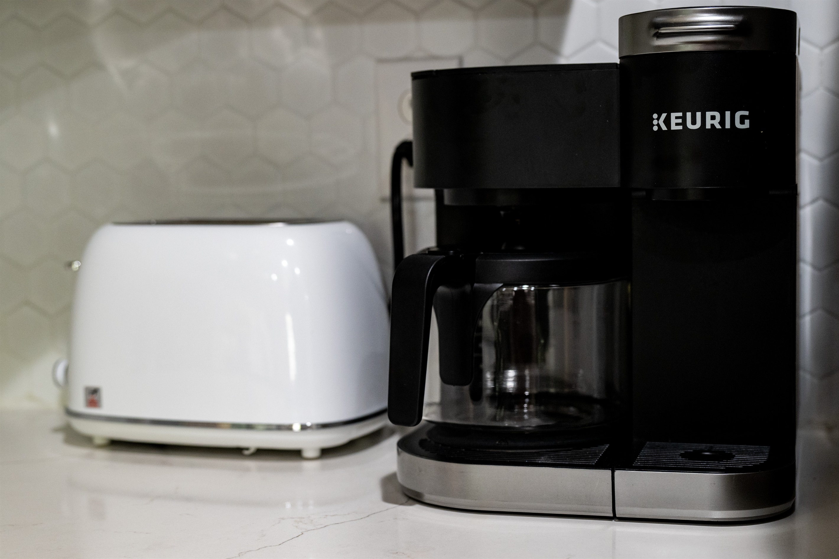 Enjoy your morning coffee with both a Keurig and drip coffee maker available.