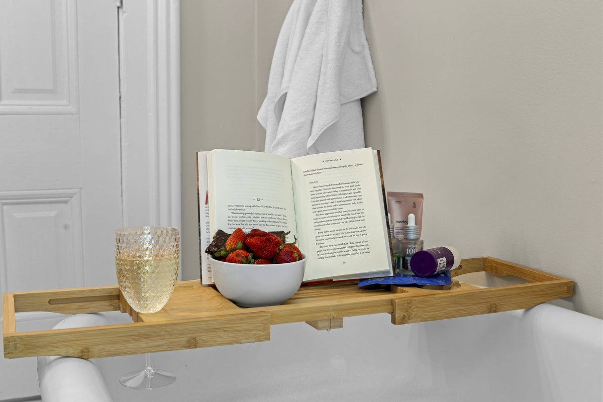 A good book, a glass of wine, fresh strawberries on the bamboo caddy. Your bath is drawn and waiting.