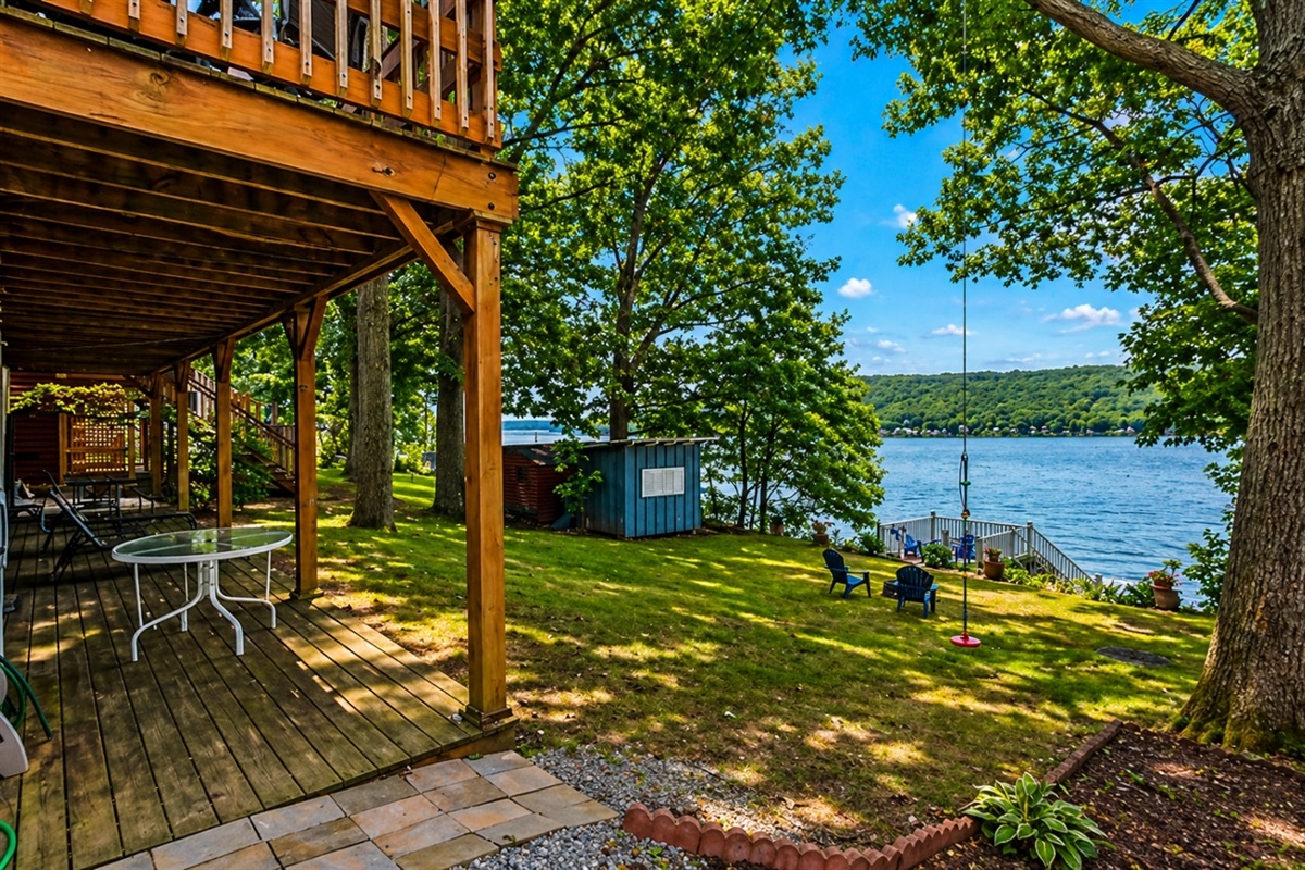Spend your days lounging on the lower deck or around the fire pit with direct access to Honeoye Lake. Ideal for outdoor enthusiasts! 
