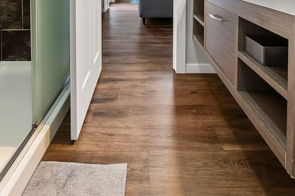 Bathroom opens seamlessly to the living area, combining function and style.