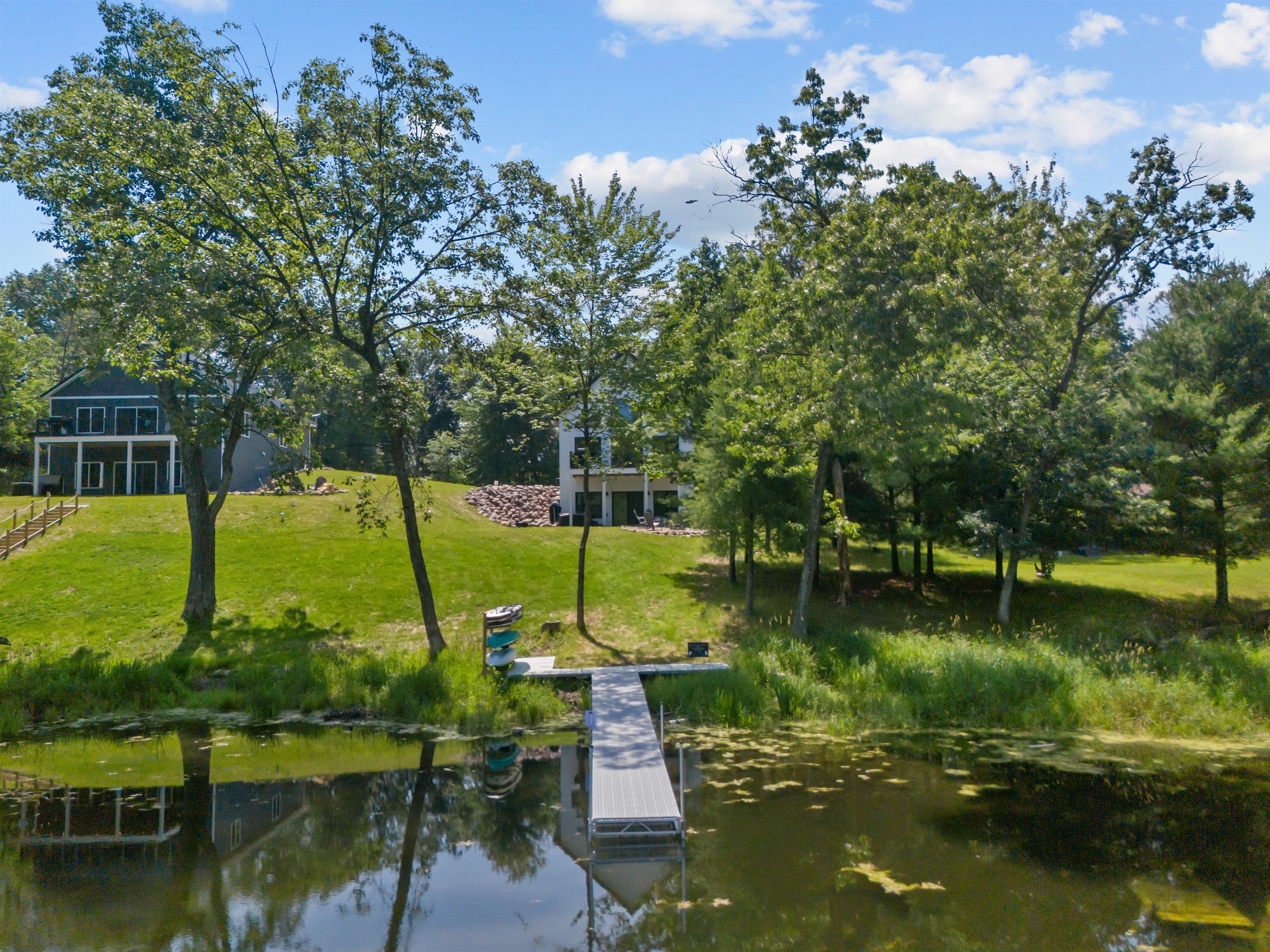 Just steps from the back door to the pier—lake life at its best! Kayaks and paddleboards are stored right by the water for easy access