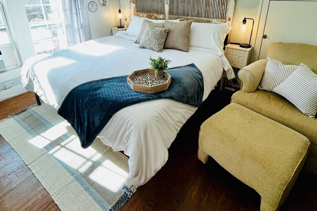Unwind in your private retreat bedroom with a plush king bed.