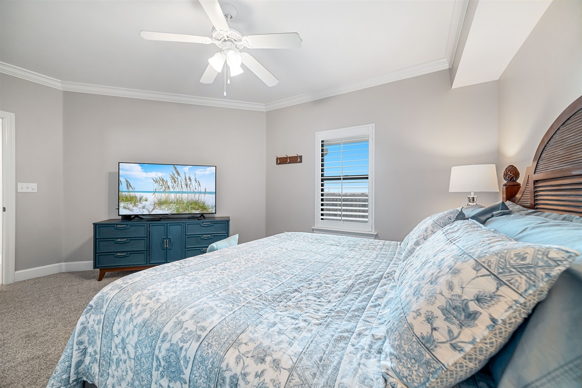 The combination of natural materials, subtle coastal accents, and abundant natural light creates a warm and welcoming ambiance.