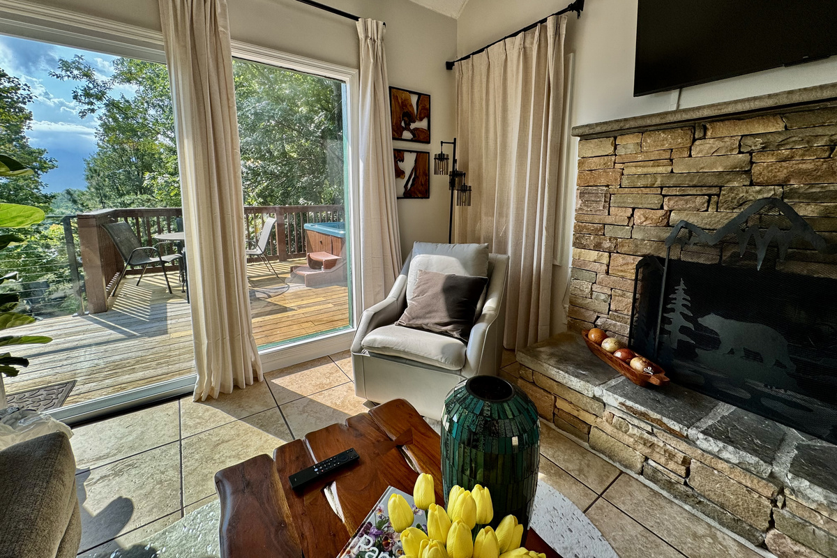 Living Room View Showing the Mountain Scenery and Gatlinburg City Lights.