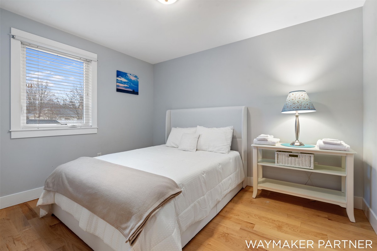 Bedroom #2 on first floor with queen bed