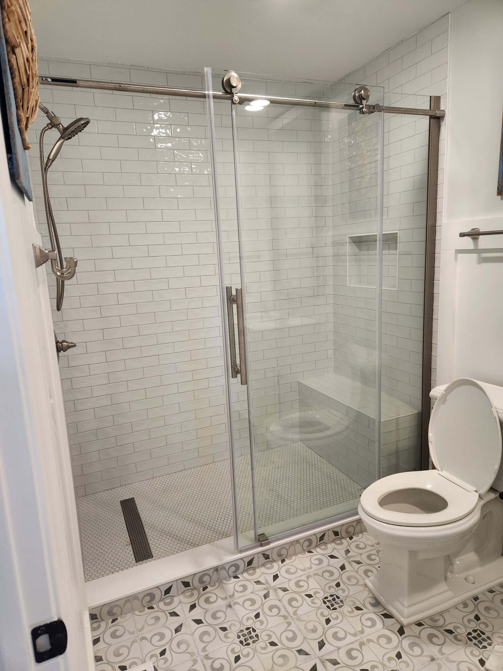 Beautifully updated shower in downstairs bathroom serving the bunk bedroom