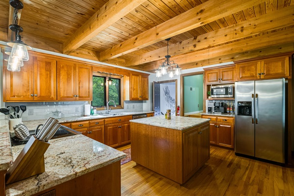 Modern kitchen stocked with essentials for family meals & late-night snacks