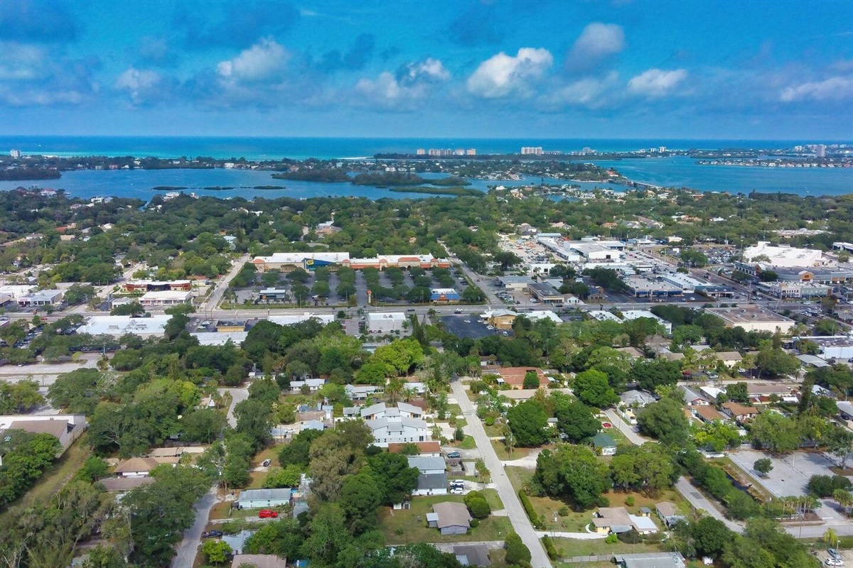 Westward aerial view above the home with views of Siesta Key.