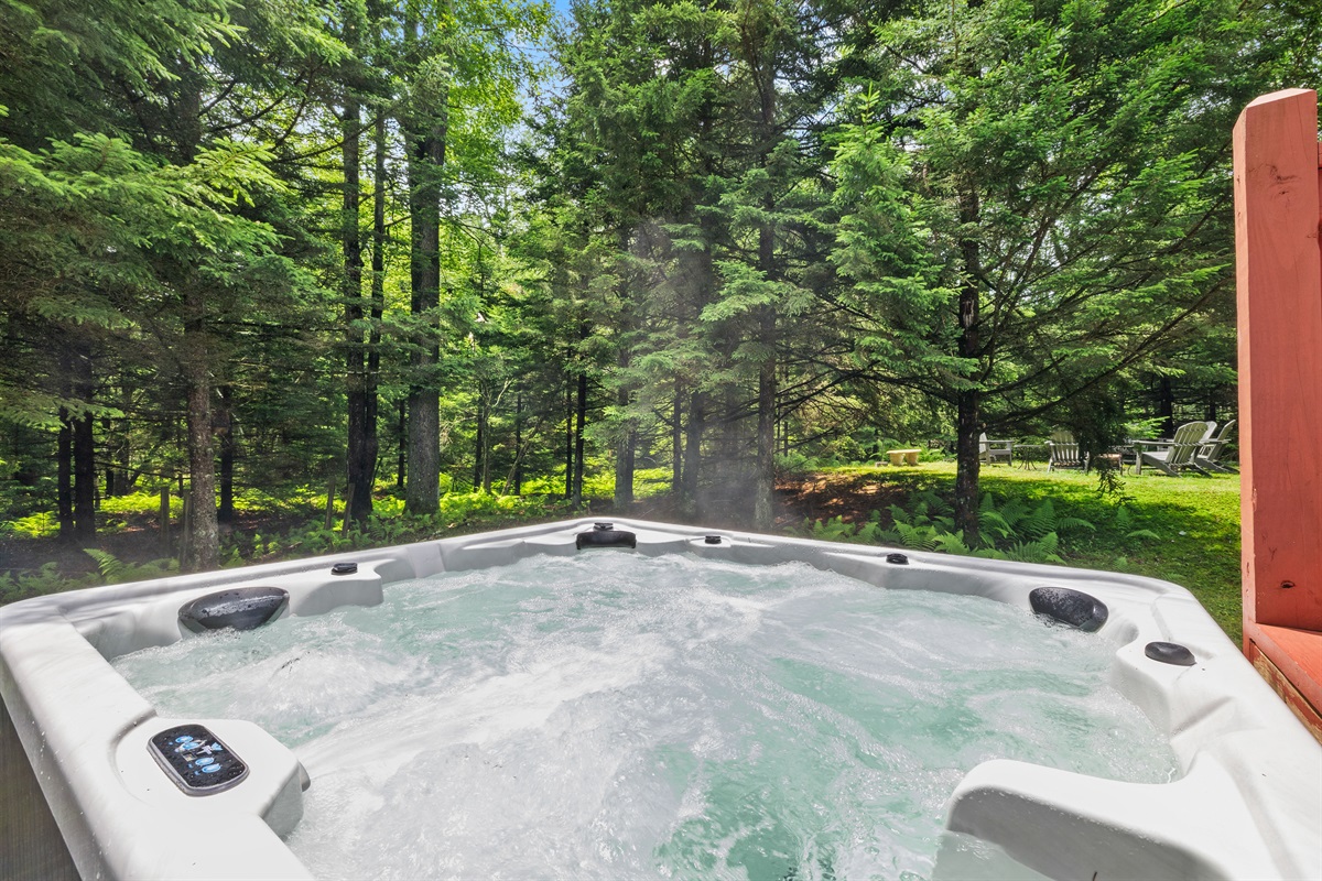 Backyard spa vibes—hot tub ready for relaxation any time of day
