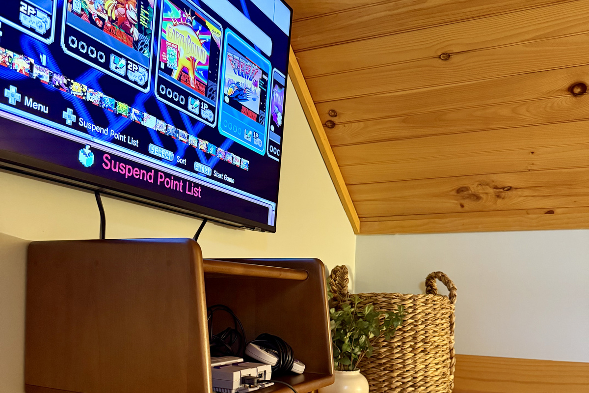 Fun loft hangout space with retro gaming system
