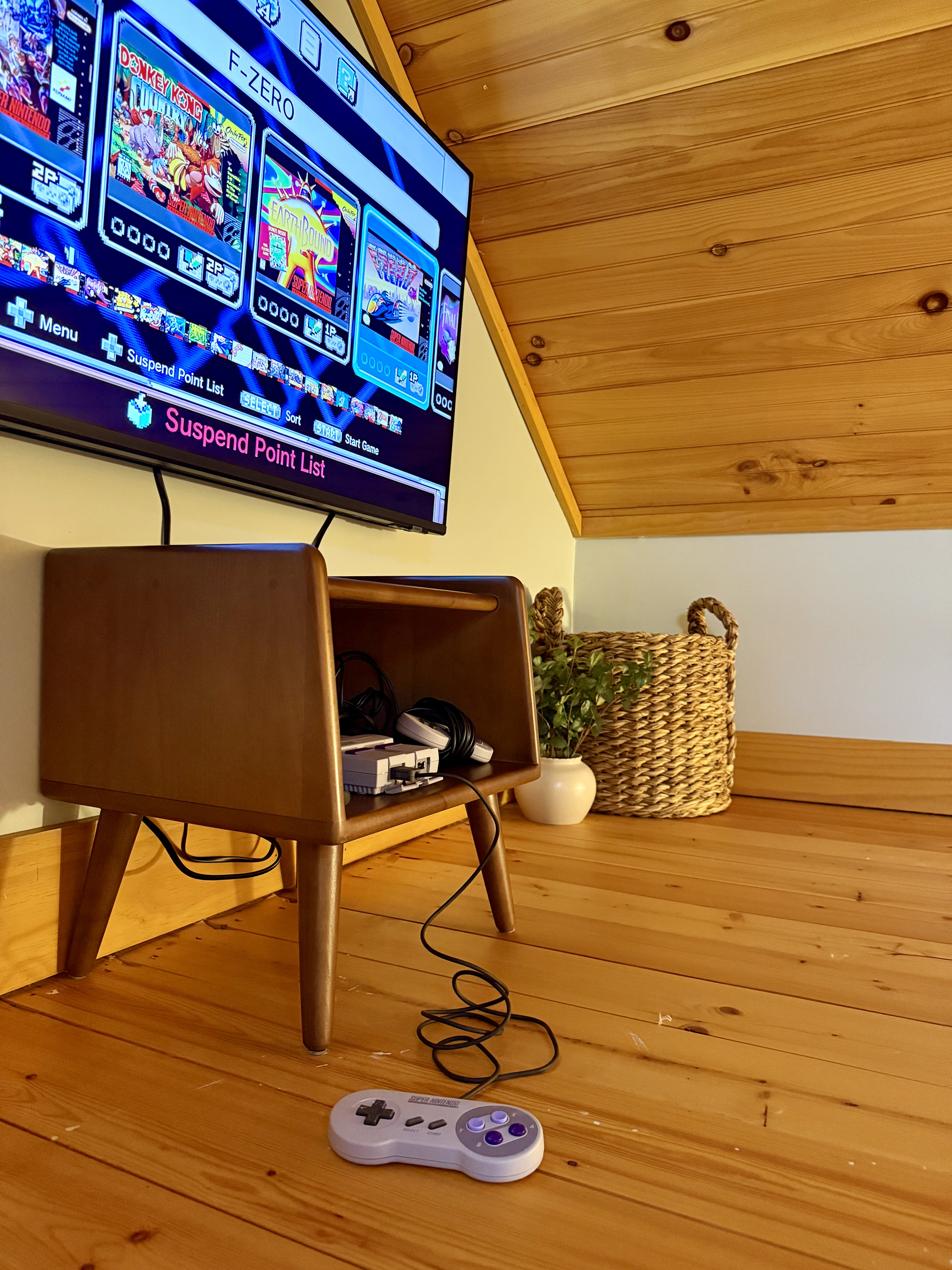 Fun loft hangout space with retro gaming system