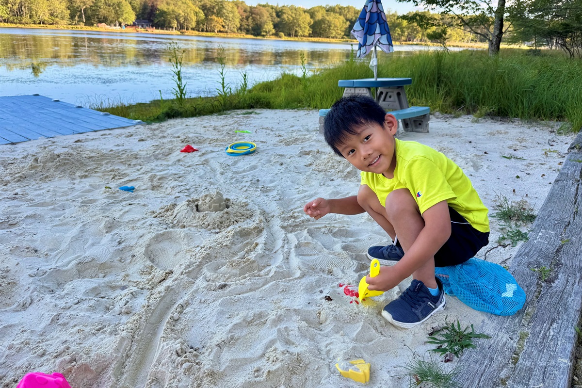 Tiny hands and sandcastles — when time stands still.