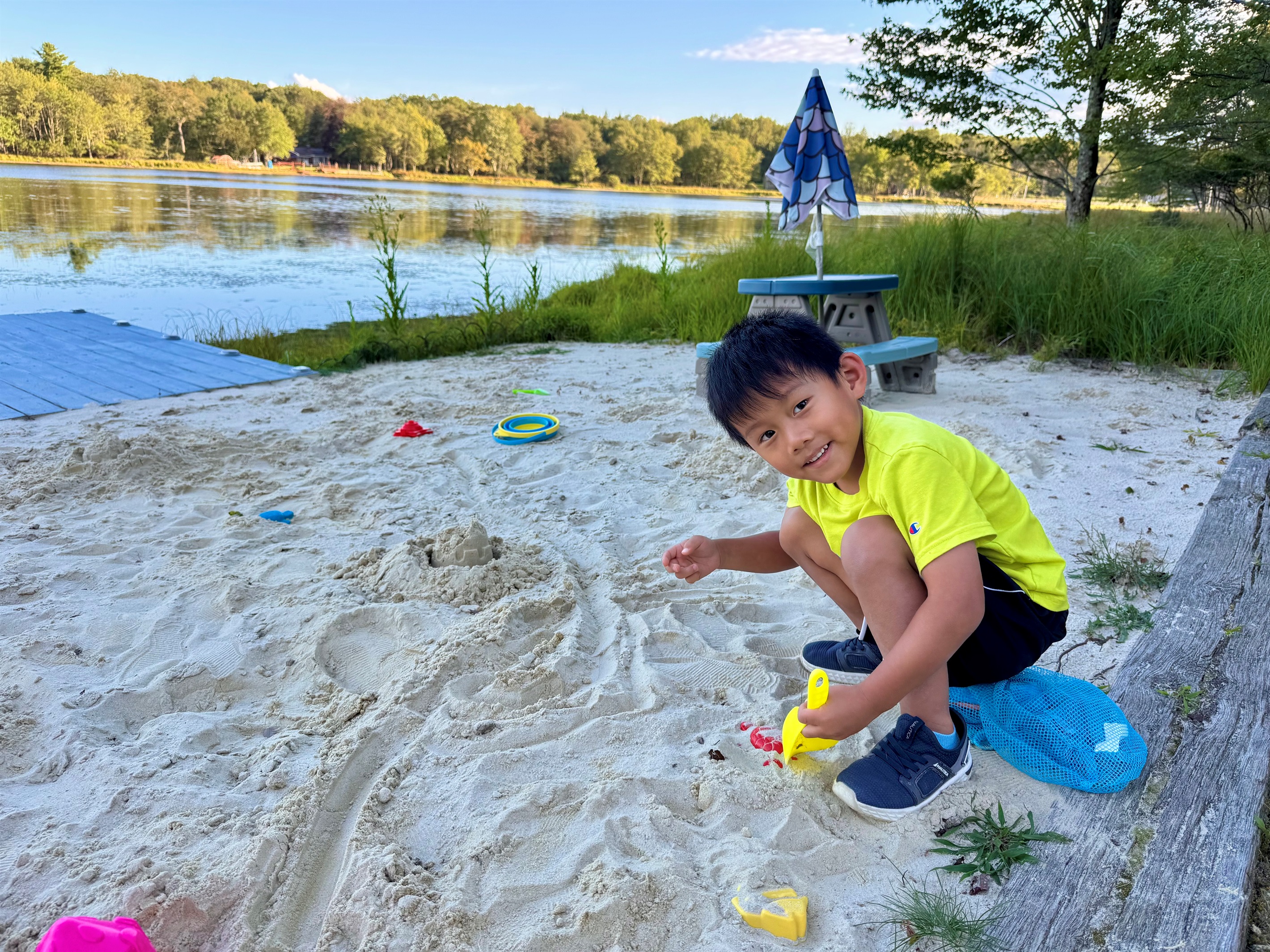 Tiny hands and sandcastles — when time stands still.