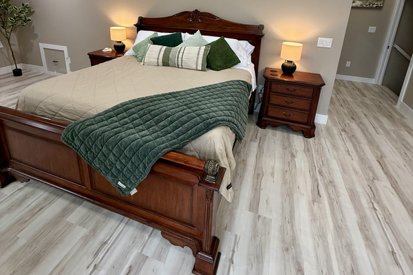 Master bedroom - king sized bed with 2 soft pillow, 2 firm pillows and a white noise maker