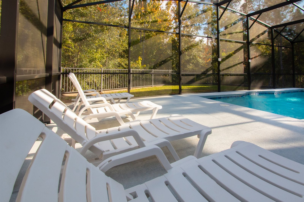 Loungers by the Private Screened Pool.