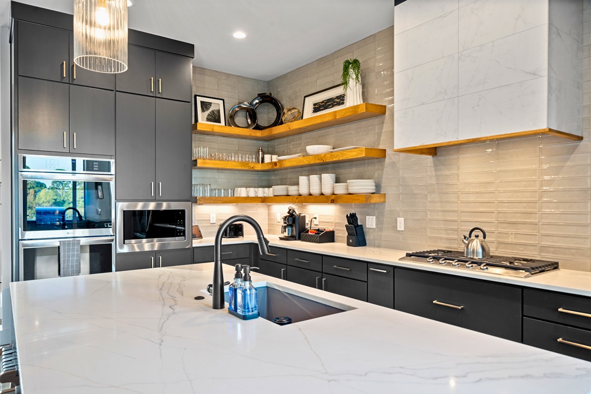 Everything you need is within reach in this organized kitchen. From snacks to drinks, it&rsquo;s designed for convenience and enjoyment.