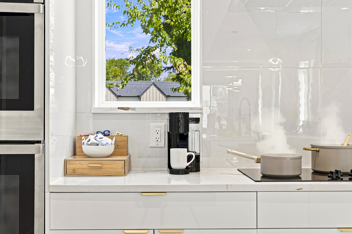 Modern appliances and a sunny view create the perfect cooking oasis!