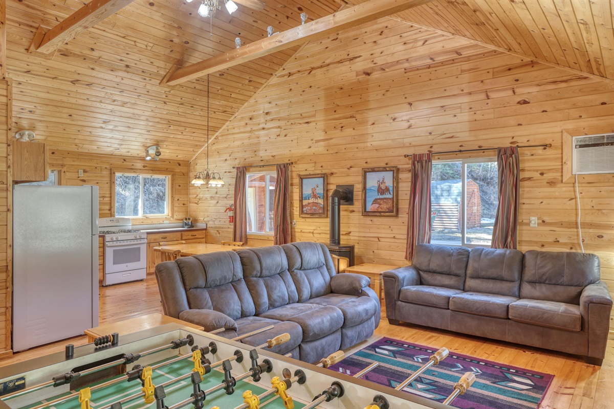 Living area with Babyfoot, and sofas