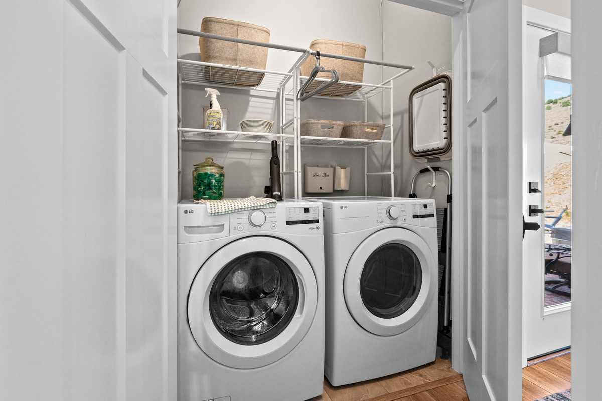 Convenient laundry area with a full-size washer and dryer, making extended stays and family vacations easy and comfortable.