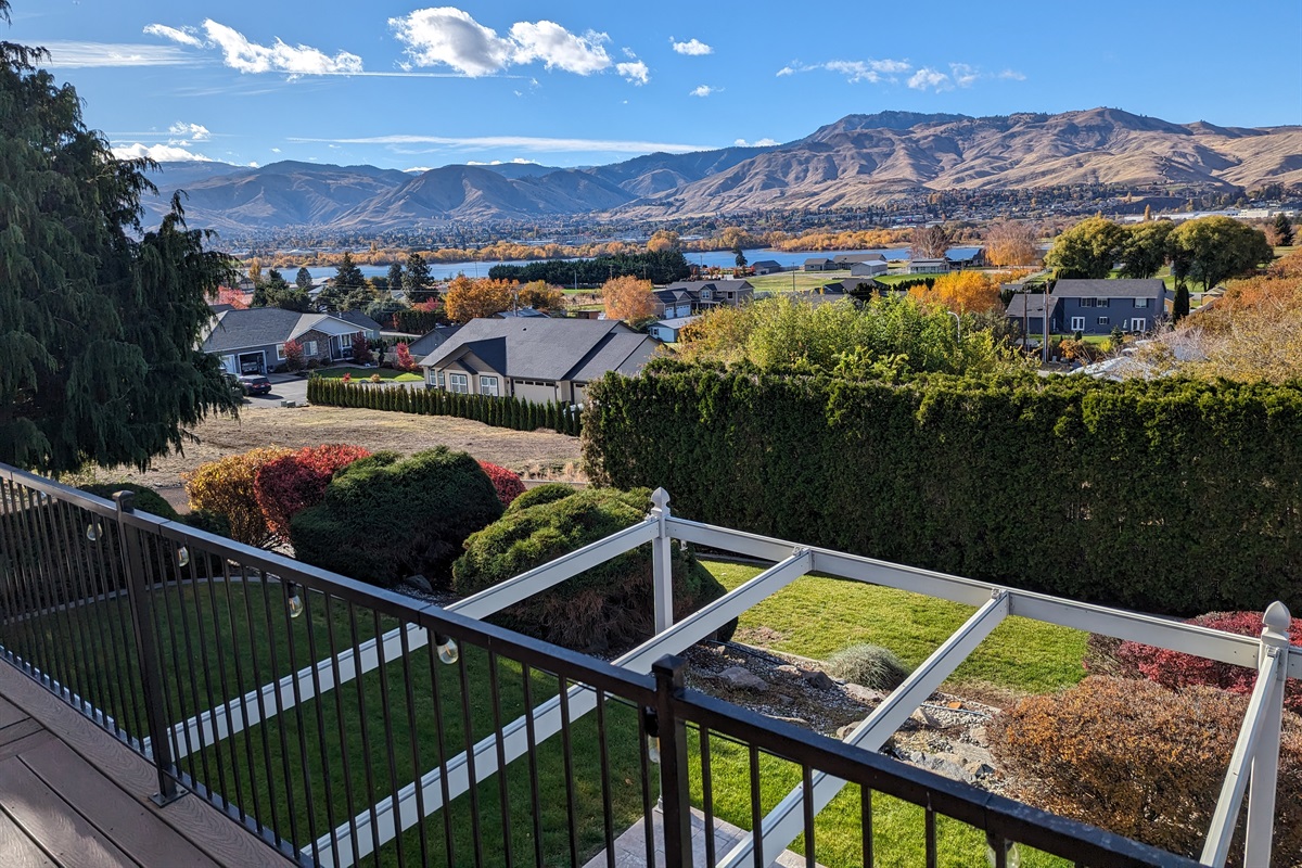 Sweeping backyard views overlooking the river and orchards.