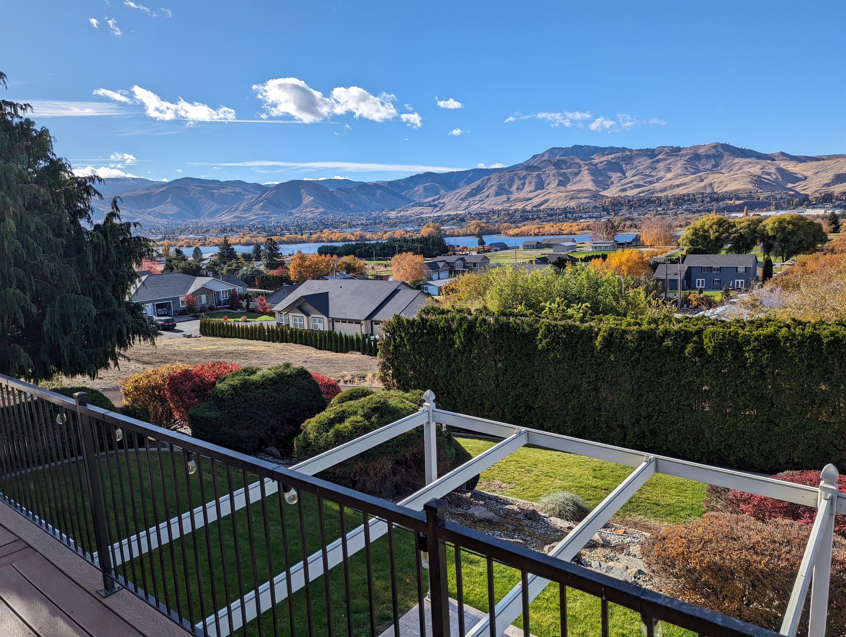 Sweeping backyard views overlooking the river and orchards.