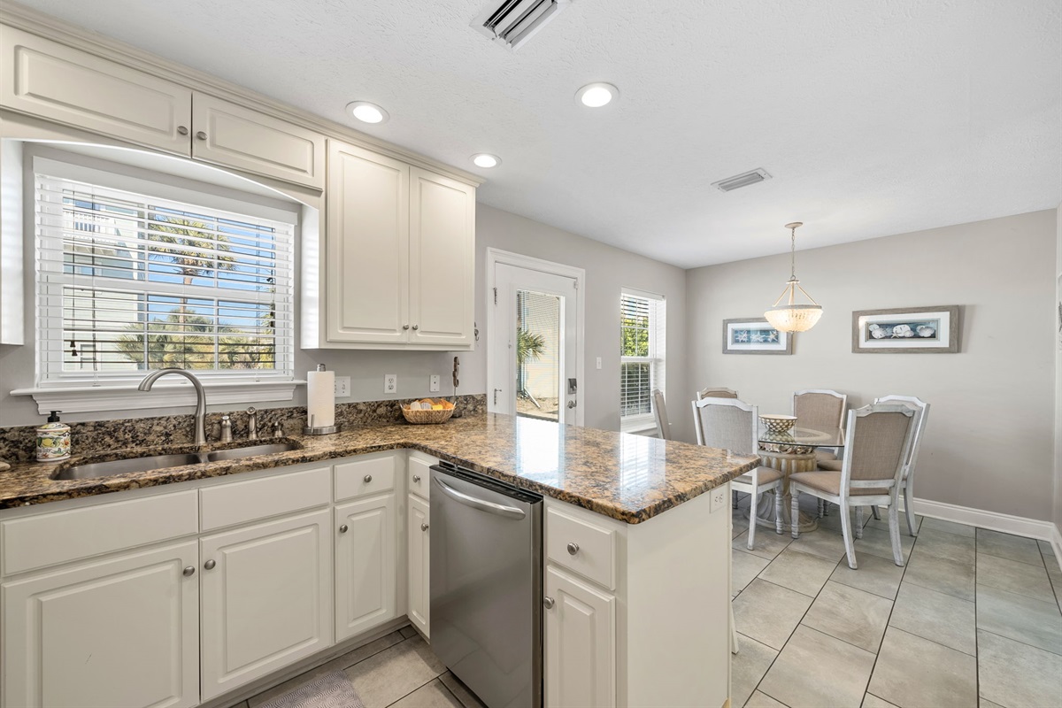 Do not have to be alone while cooking! The dining room is right there. 