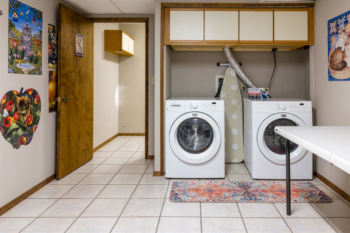 Full laundry room for guest convenience.