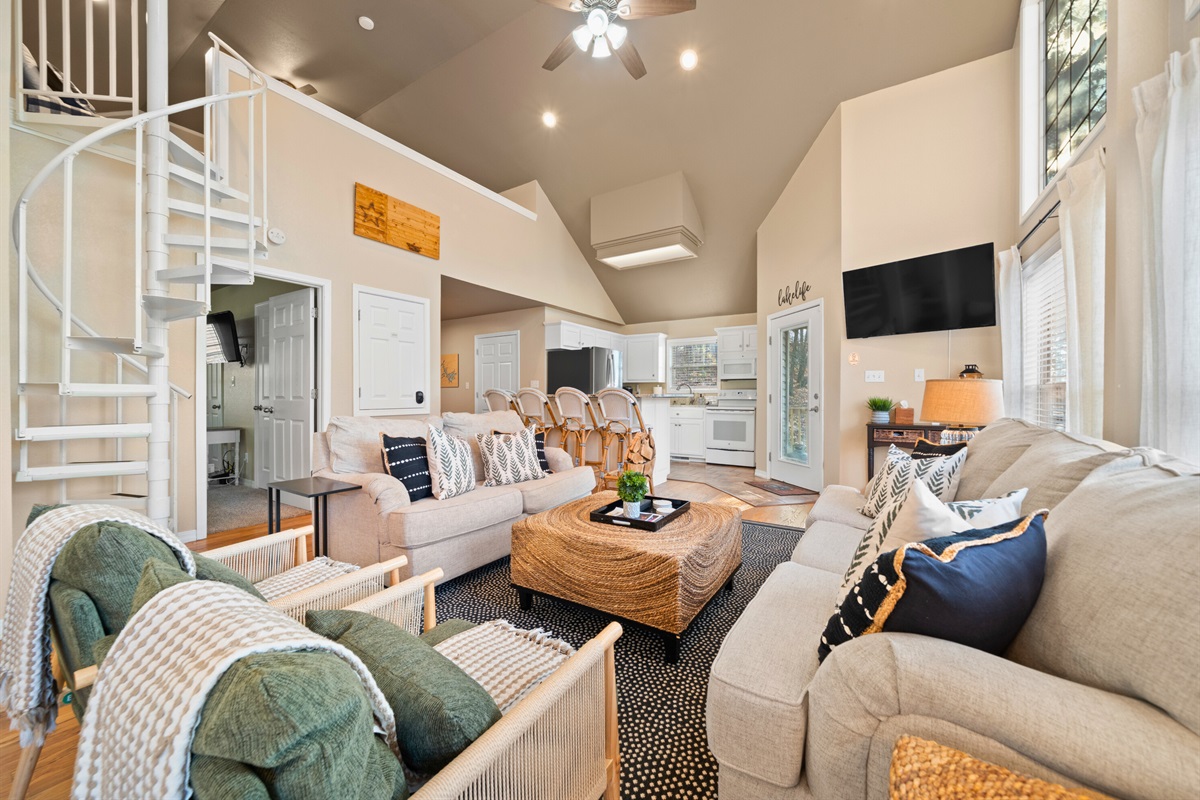 Soft textures and warm tones give this living room a cozy charm that makes it easy to settle right in.