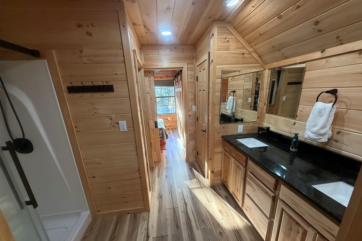 Access to Bedroom 1 is through Bathroom 1