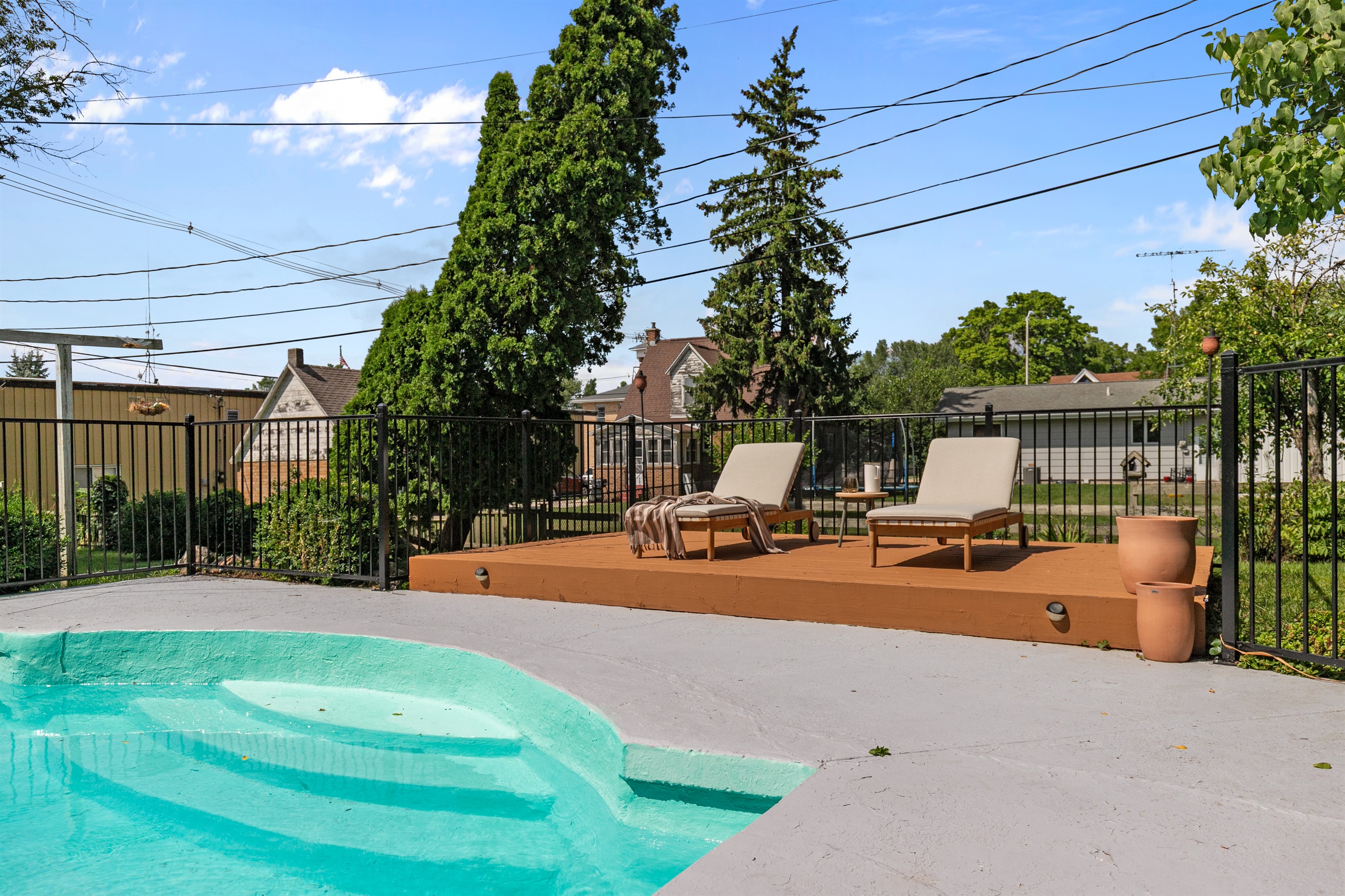 Stretch out in the lounge chairs by the pool, the perfect place to soak up the sun, relax with a book, or simply enjoy the view.