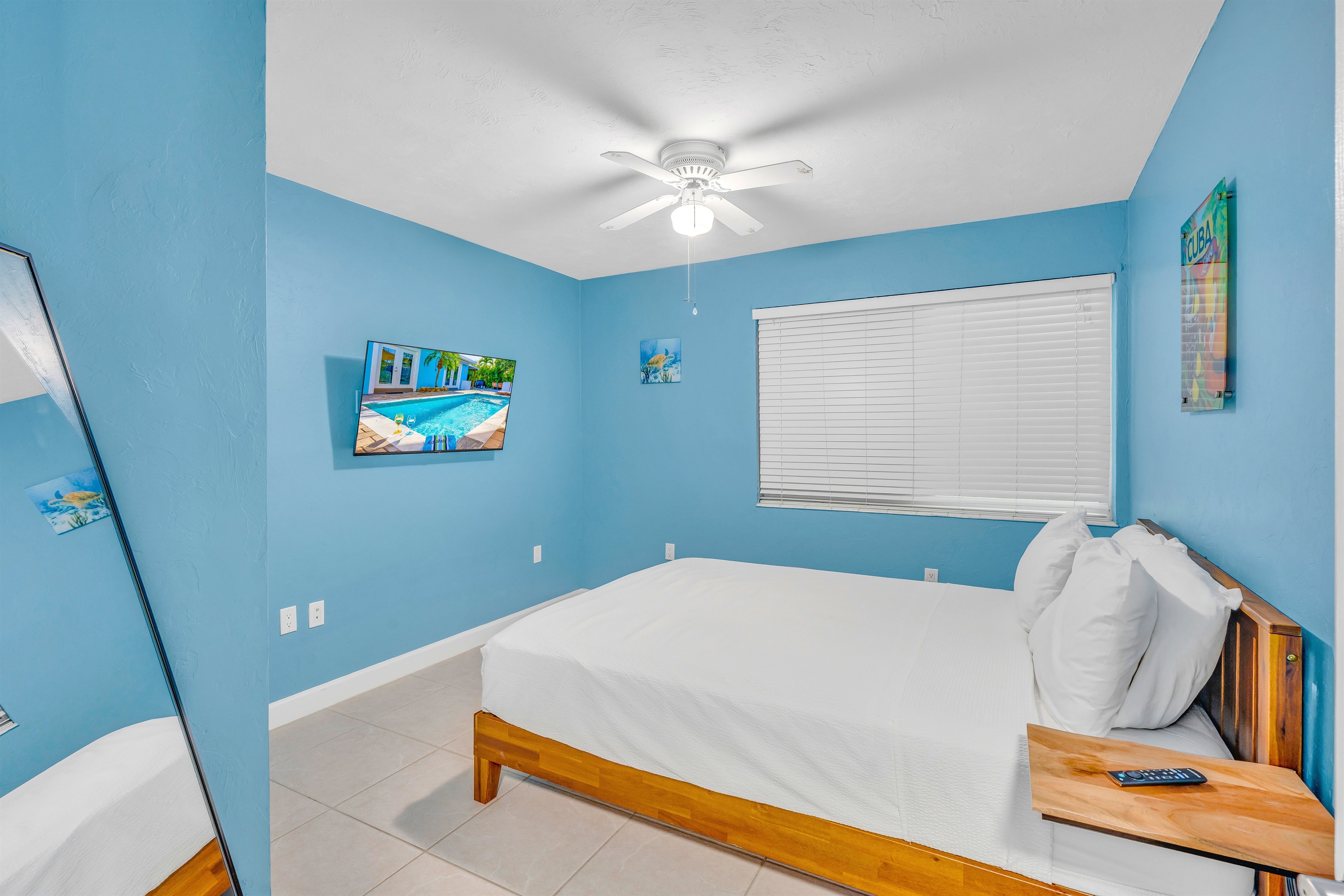 A second bedroom down the hall with a queen size bed.