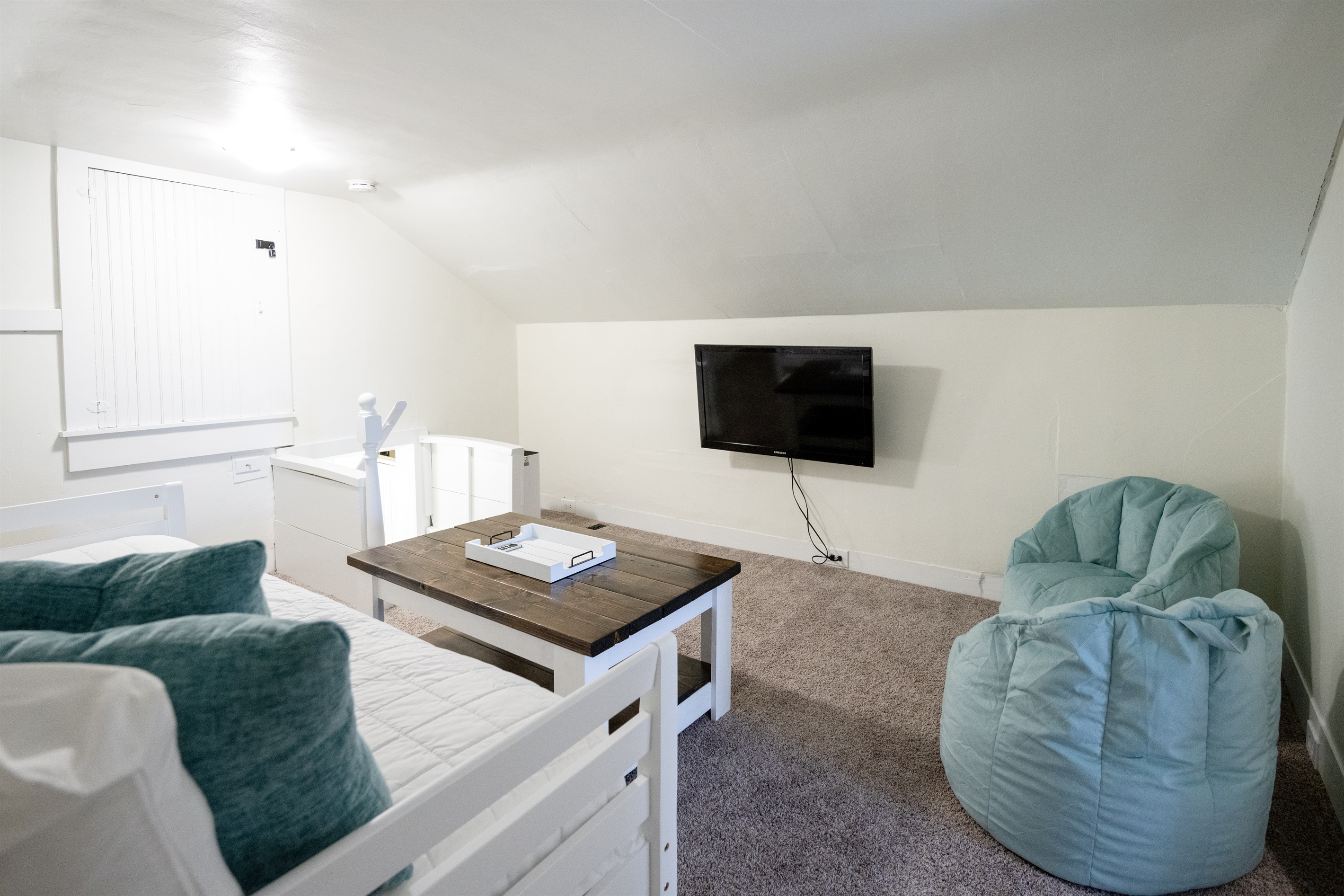 Upstairs second living room with additional beds