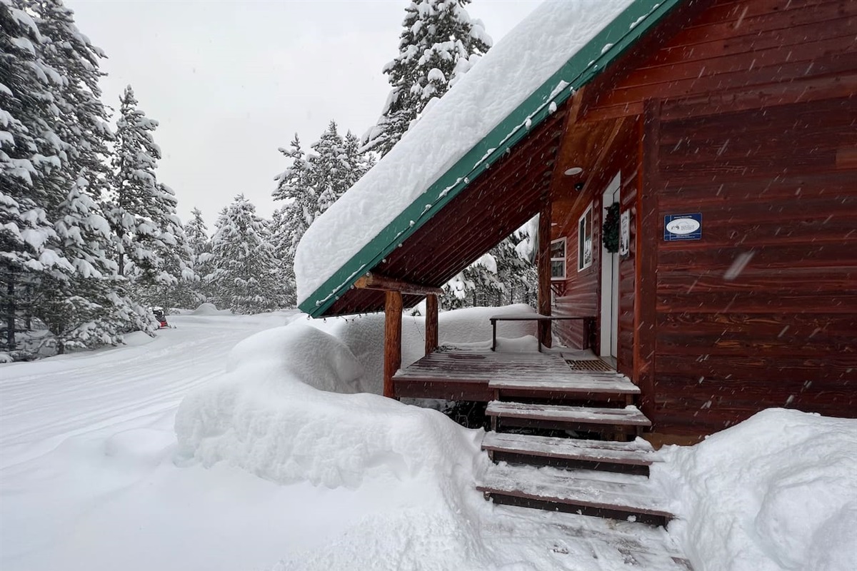 Back entrance - which serves as the main entrance in the winter. Peaceful and beautiful in the winter. Cabin is well heated.