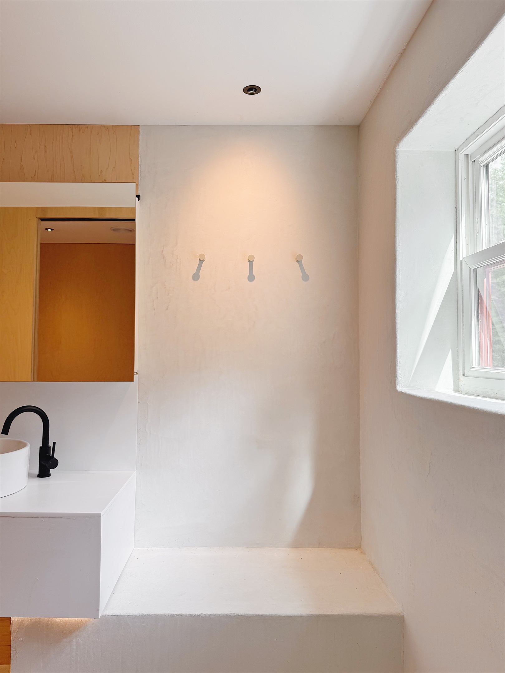 Upstairs shower with bench