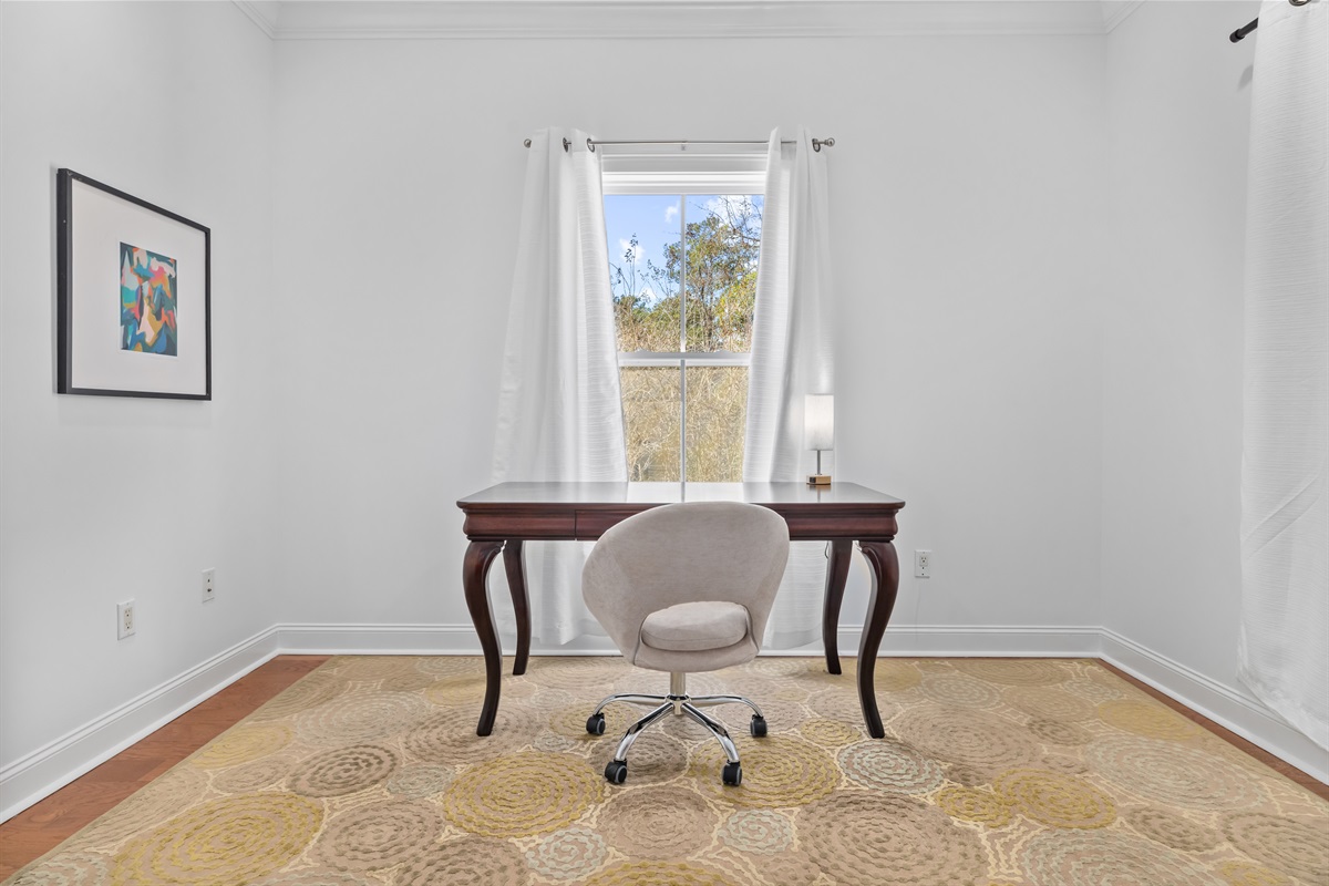 A dedicated work desk offers flexibility when needed, and the private en-suite adds comfort and convenience.