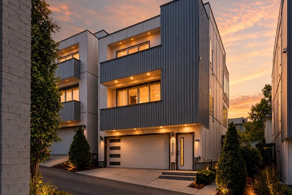 Step up at dusk and the building makes its own statement &mdash; four levels lit against the Nashville sky before you even walk in the front door.