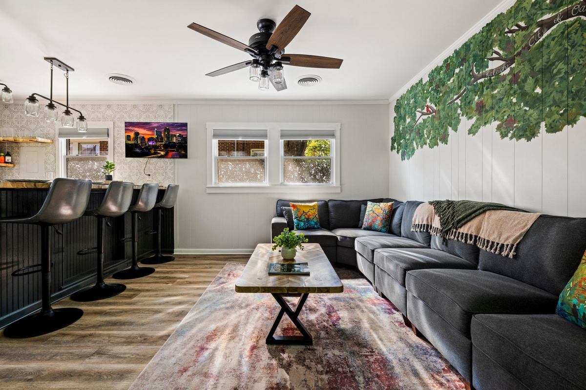 The Raleigh side living room offers comfortable seating for movie nights, conversation, or planning tomorrow's adventures.
