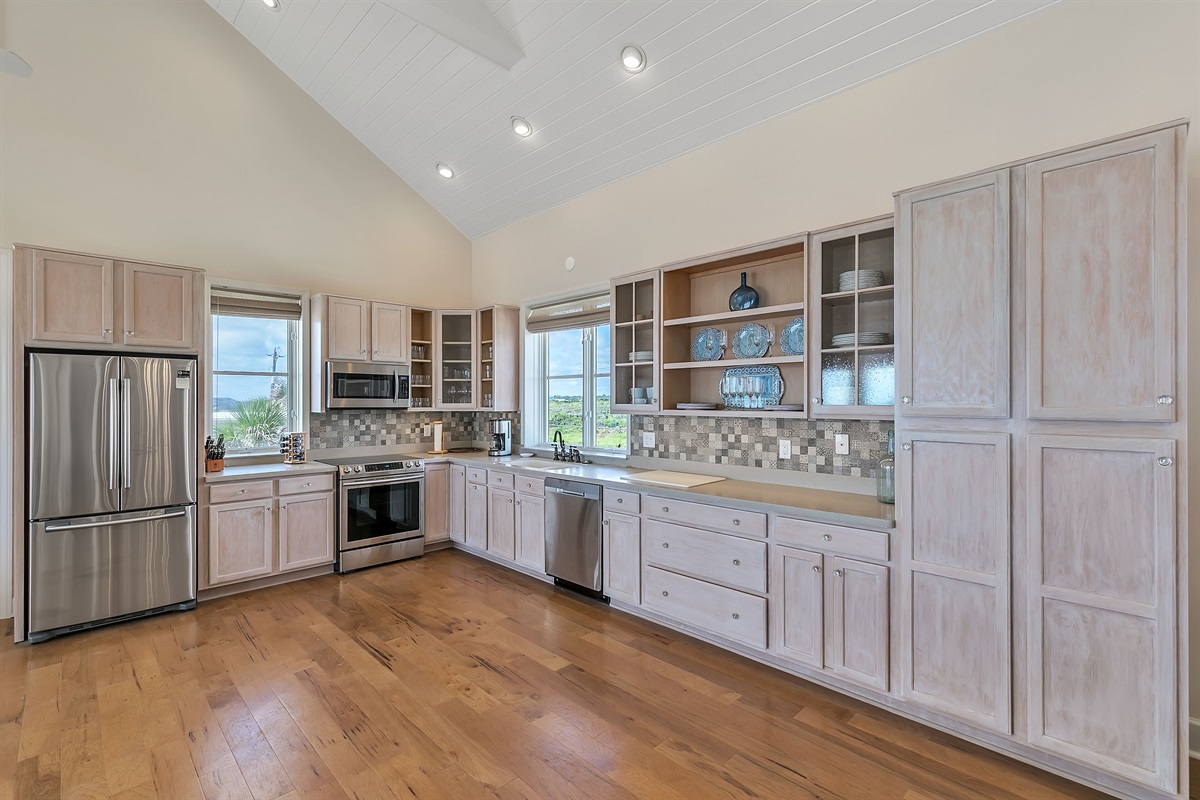 Gourmet kitchen with stainless appliances and views of Guana State Park & ocean