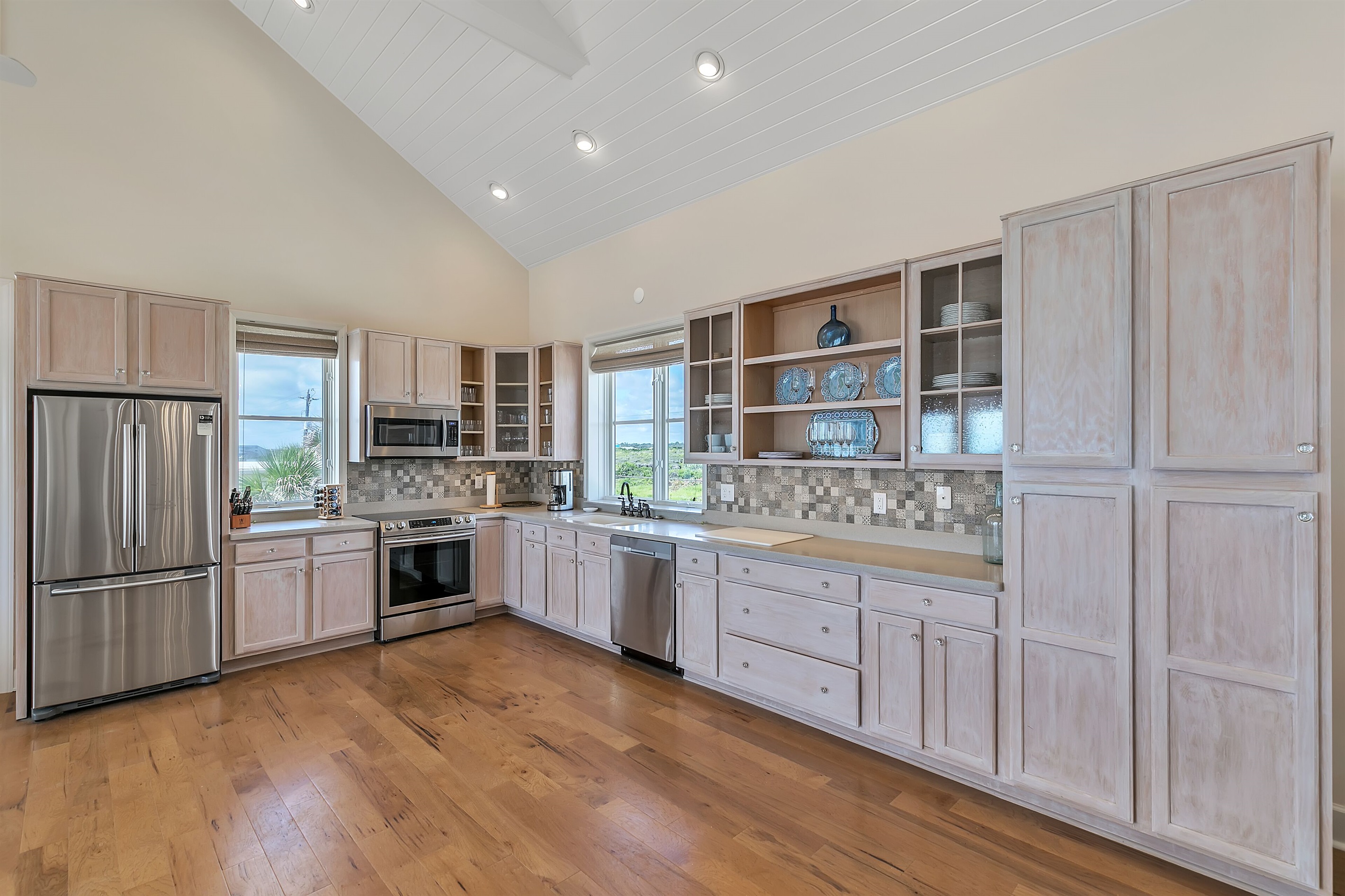 Gourmet kitchen with stainless appliances and views of Guana State Park & ocean