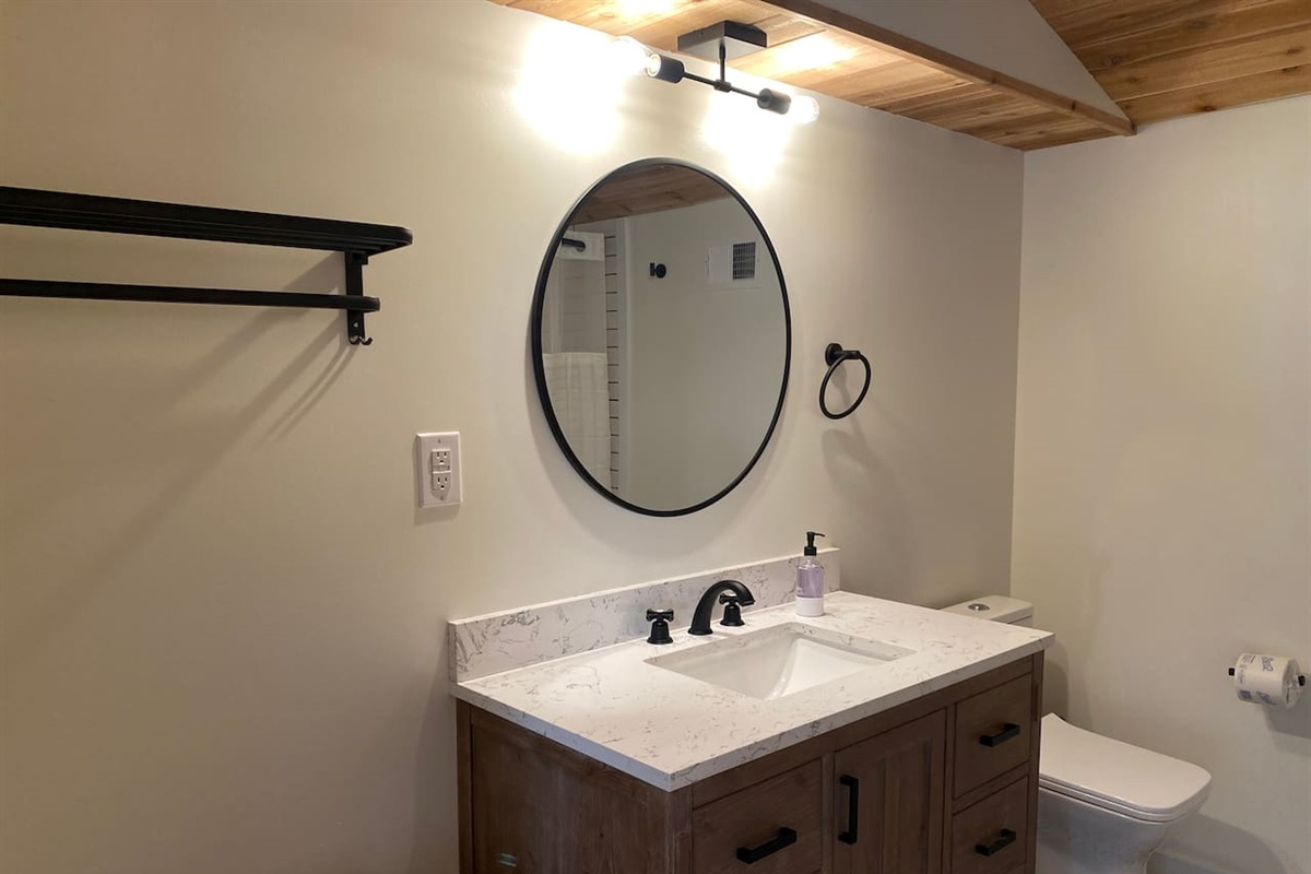 Second floor bathroom with bathtub 