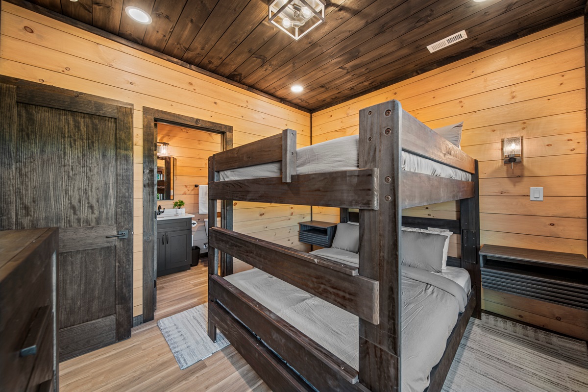 Queen bunk bedroom with private bath — perfect for families.