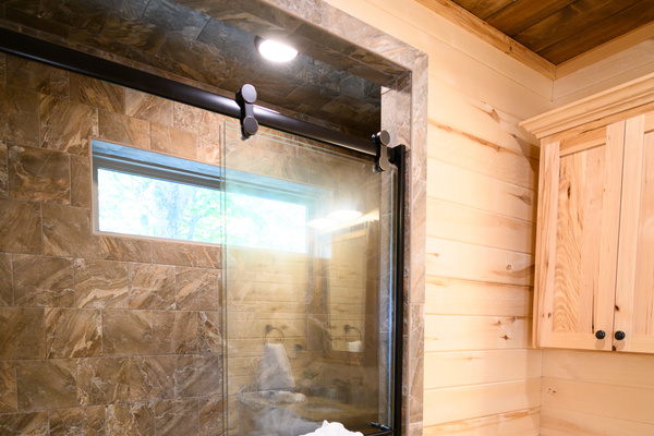 Roomy tiled shower.