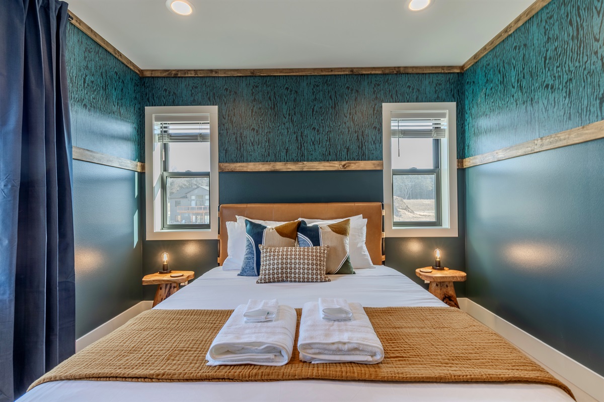 Upstairs queen memory foam bedroom with Roku TV.