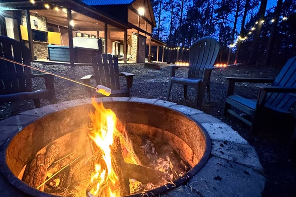 Firepit area perfect for gathering, roasting s’mores, and enjoying cozy nights under the stars with family and friends.