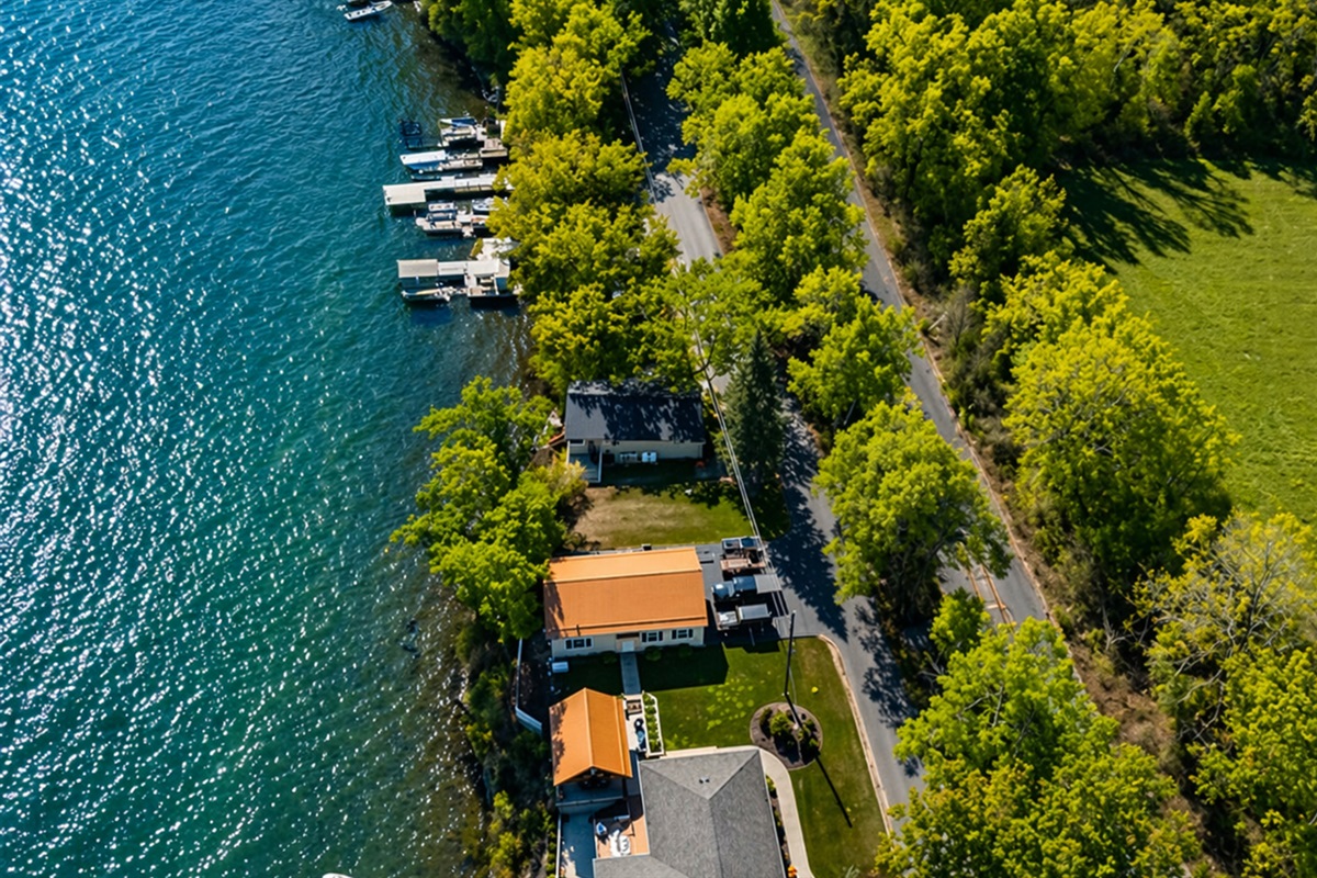 Your own slice of paradise with a private dock and crystal-clear water just steps away.