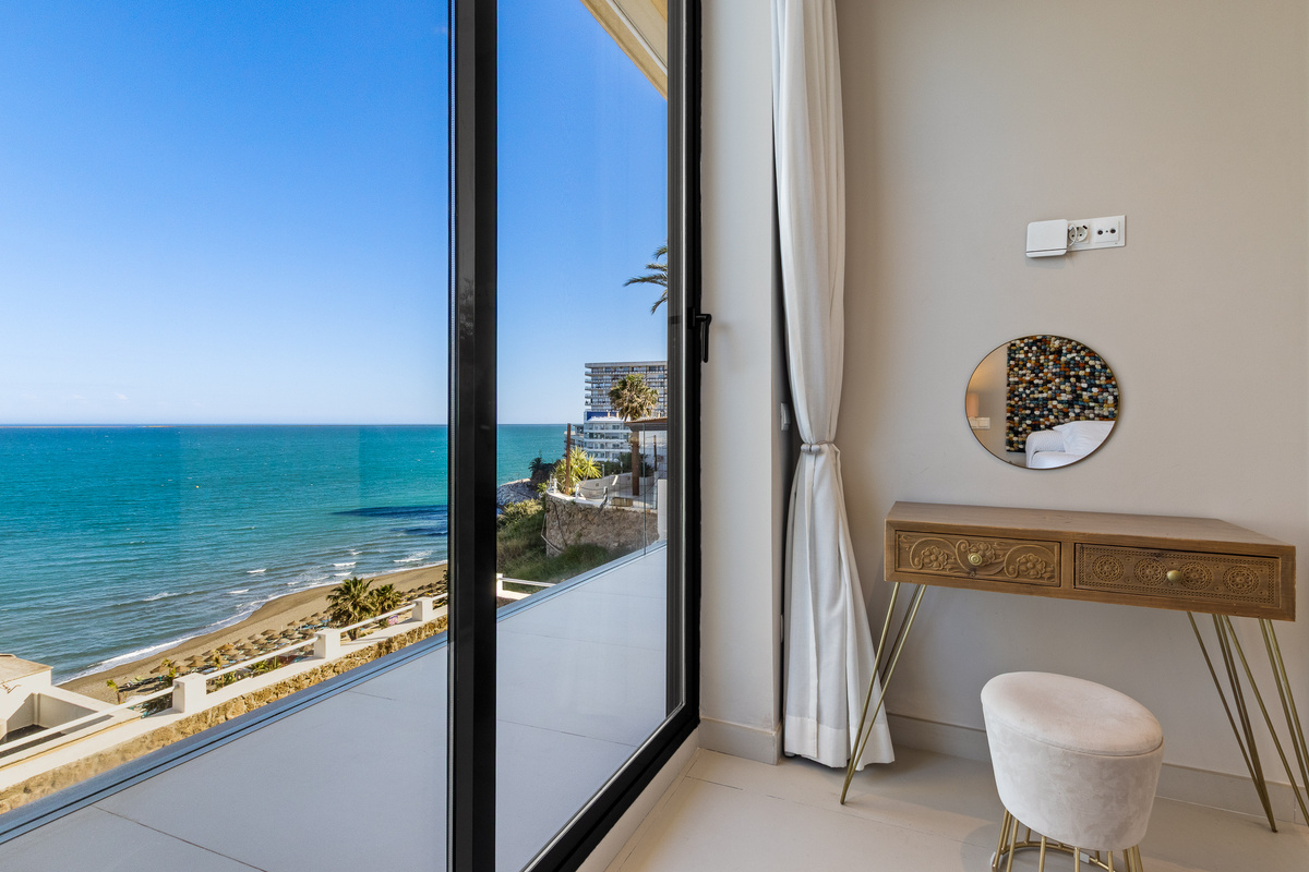 Corner of the second bedroom with vanity and beautiful sea views